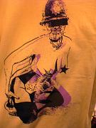 T-shirt print of almost-naked female body with bearded policeman's head